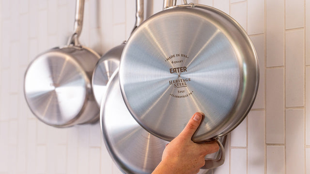 A clean stainless pan going back on the hook