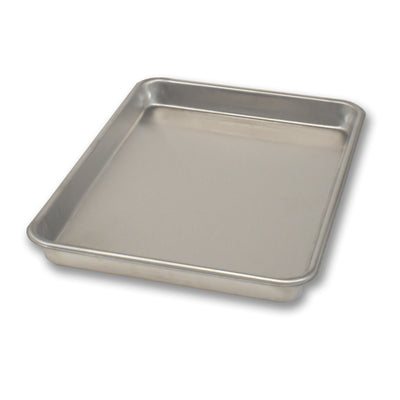Metal baking tray on a white background