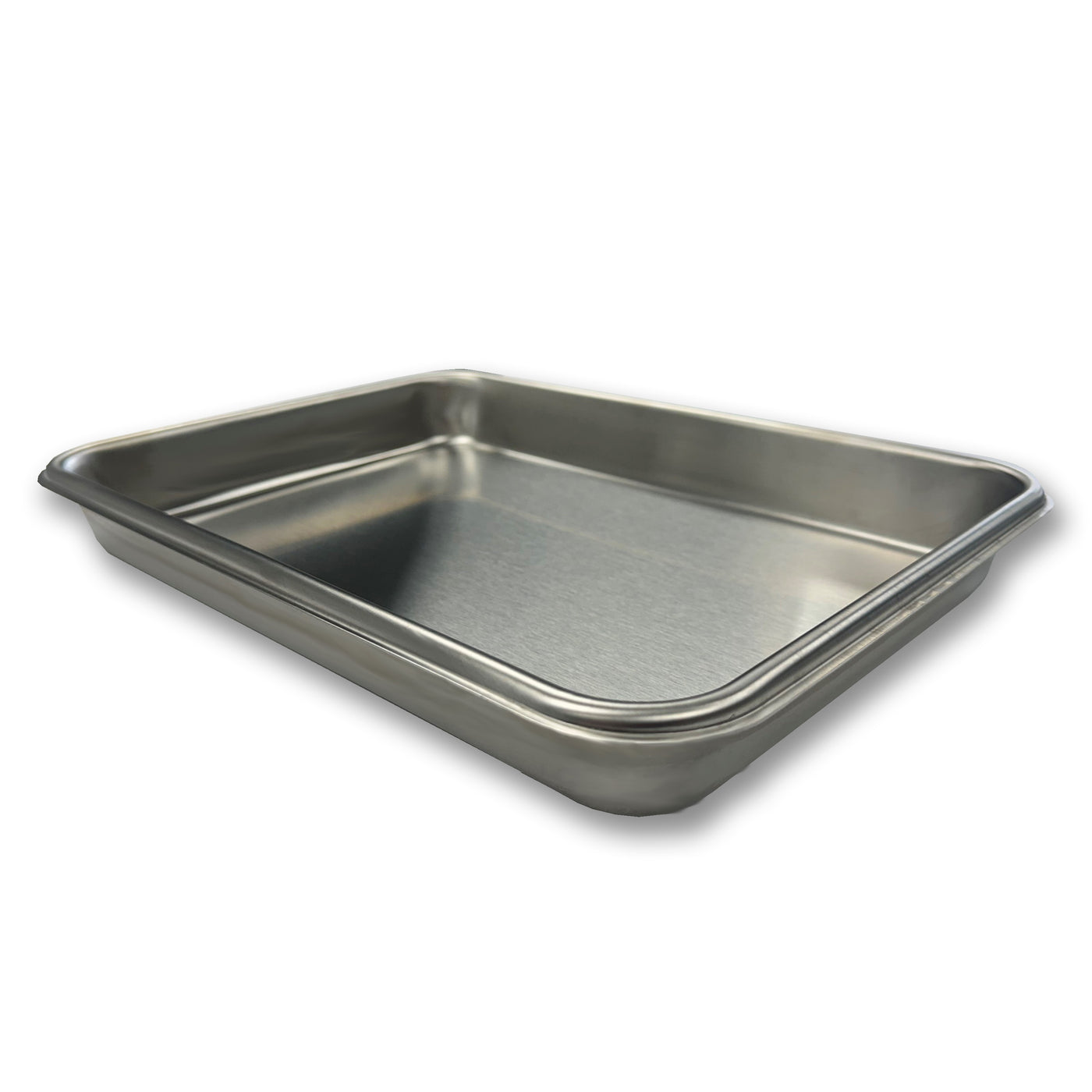 Stainless steel baking tray on a white background