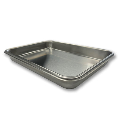 Stainless steel baking tray on a white background
